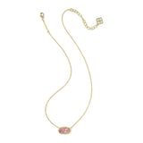 A delicate gold chain necklace featuring an oval pink gemstone pendant, displayed on a clean white background.