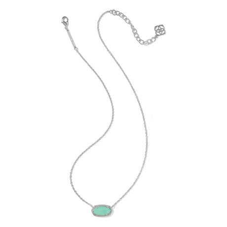 A silver chain necklace featuring an oval pendant with a light mint green center, displayed on a clean white background.
