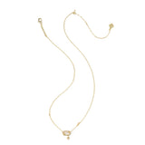 A delicate gold chain necklace with a small oval pale pinkish-beige center stone and a tiny dangling bead, displayed on a clean white background.
