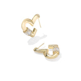 A pair of gold huggie hoop earrings with rectangular clear gemstones, shown on a clean white background.