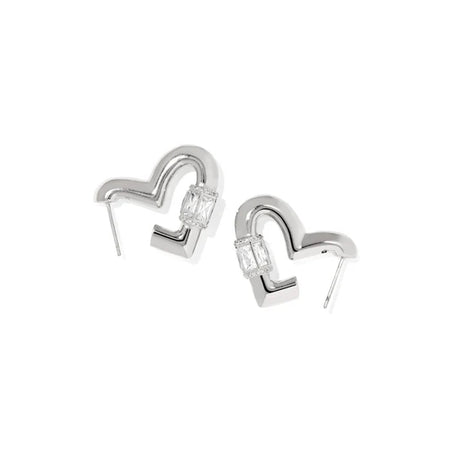 A pair of silver-toned geometric earrings with a curved, open heart-like shape and clear rectangular gemstones, shown on a plain white background.