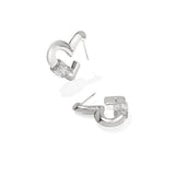 A pair of silver-toned C-shaped hoop earrings with a clear rectangular gemstone at the front, shown on a clean white background.