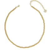 A gold chain anklet with a textured, rope-like woven design, featuring a lobster clasp on one end and an adjustable link extender with a small decorative charm on the other, shown against a plain white background.