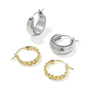 Four small hoop earrings on a white background: two silver-toned hoops with textured inner edges and two gold-toned braided chain hoops.