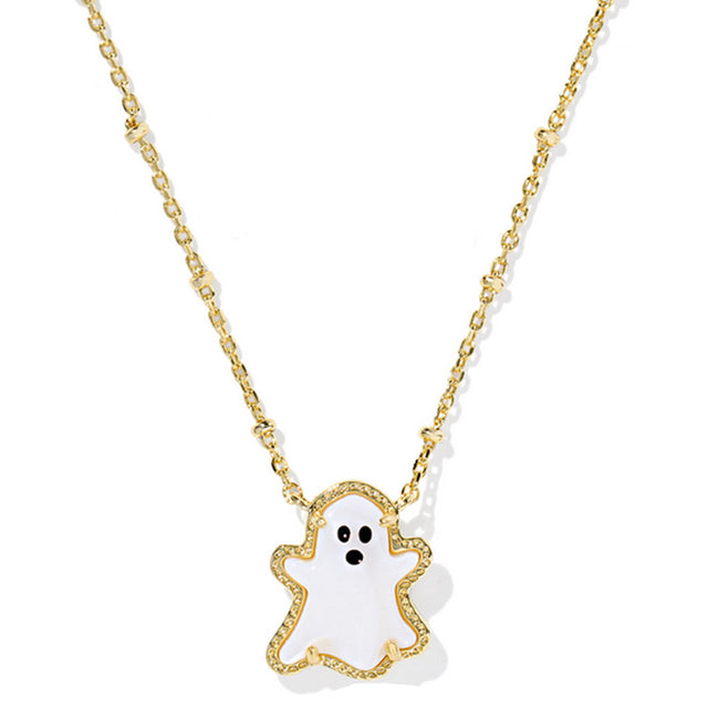 Gold necklace with a ghost pendant on a white background