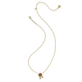 A delicate gold chain necklace featuring a small mushroom-shaped pendant with a reddish-brown cap, displayed on a clean white background.