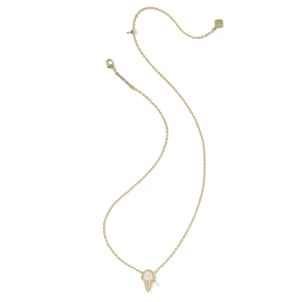 A delicate gold chain necklace featuring a small pendant with a white inlay, displayed on a clean white background.