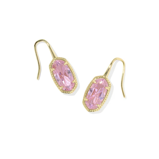 A pair of gold drop earrings featuring marquise-cut pink gemstones in a bezel setting with a delicate milgrain border, shown on a plain white background.