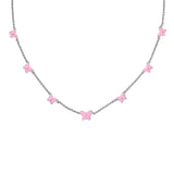 Necklace with pink butterfly pendants on a white background