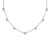 Silver necklace with butterfly pendants on a white background