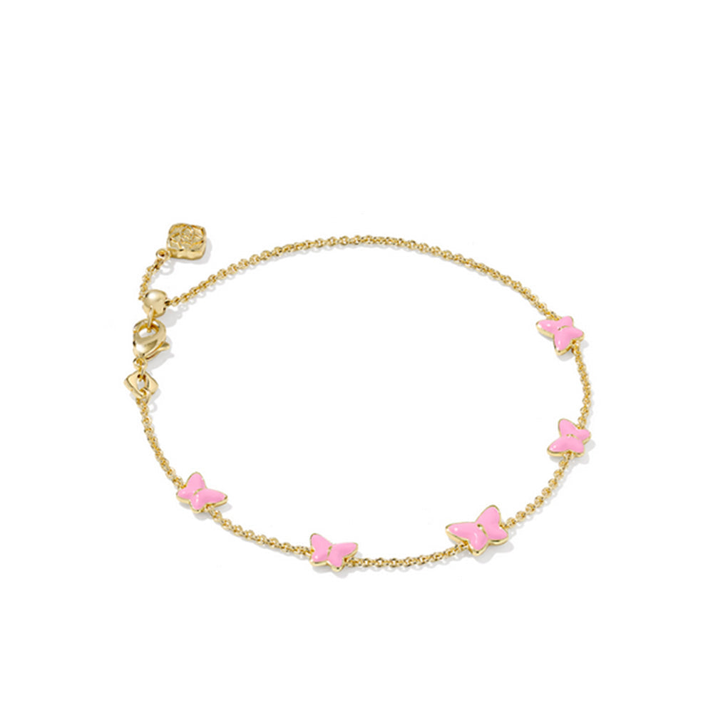 Gold bracelet with pink butterfly charms on a white background