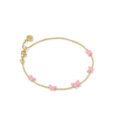Gold bracelet with pink butterfly charms on a white background