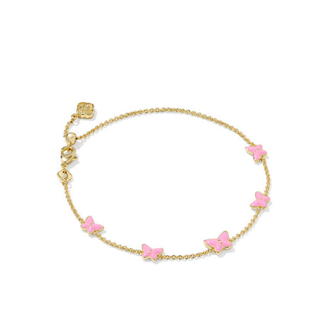 Gold bracelet with pink butterfly charms on a white background