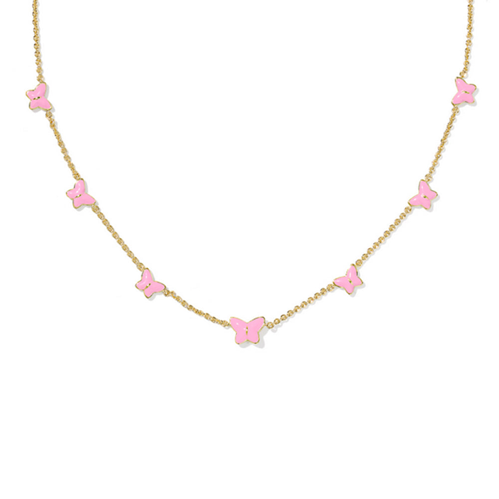 Necklace with pink butterfly pendants on a gold chain against a white background