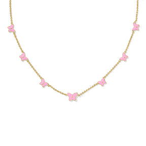 Necklace with pink butterfly pendants on a gold chain against a white background