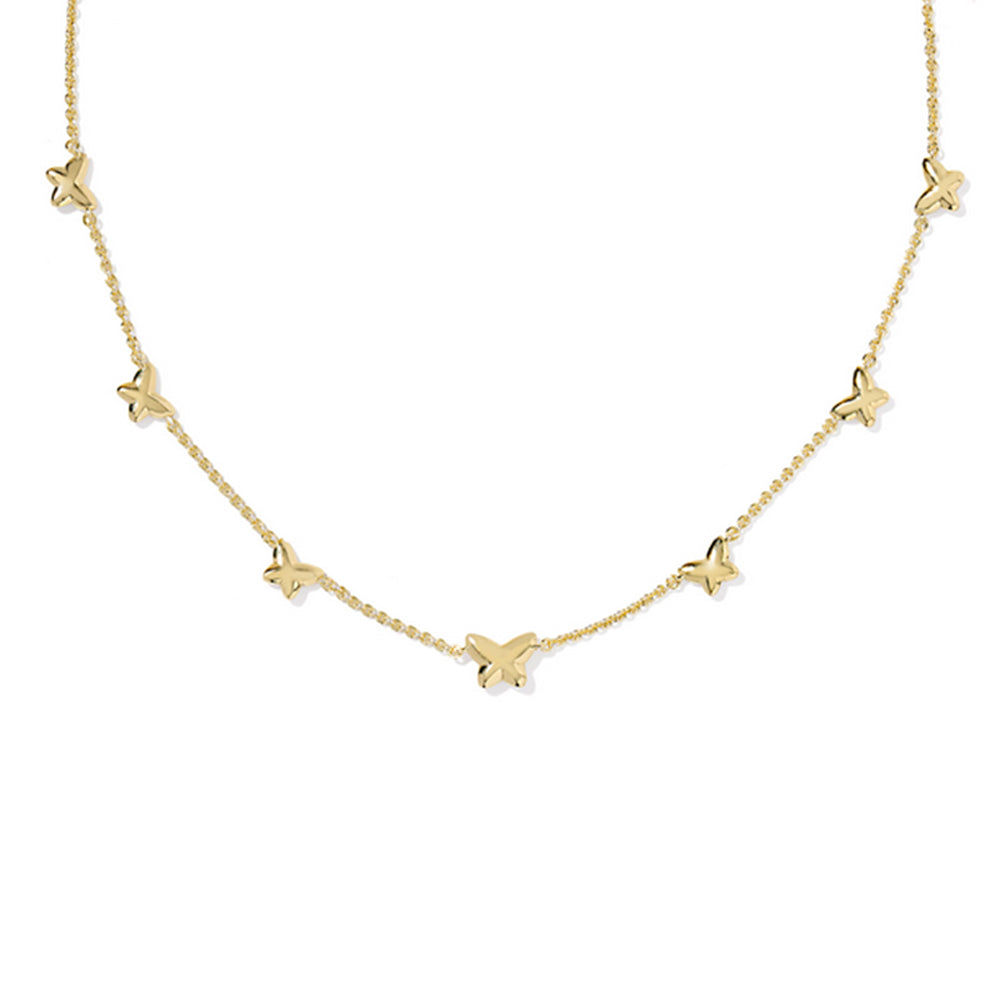 Gold necklace with small butterfly pendants on a white background