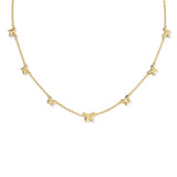 Gold necklace with small butterfly pendants on a white background