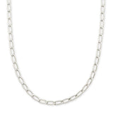 A silver Figaro chain necklace with polished oval links, displayed in a curved shape against a solid white background.