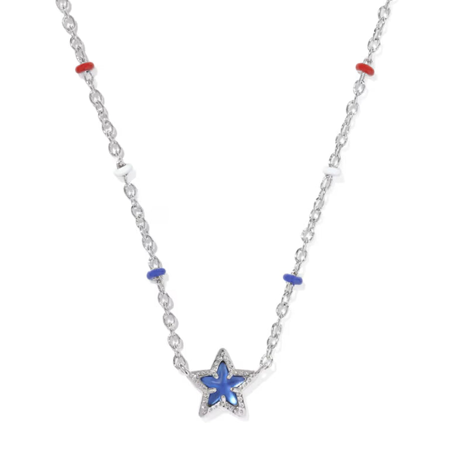 A silver-toned star pendant necklace with a blue inlay, accented by small red and blue beads on a white background.