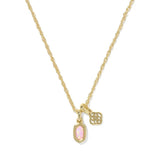 A gold chain necklace featuring two charms: a small oval pink opal-like stone pendant and a small gold filigree flower charm, shown on a plain white background.