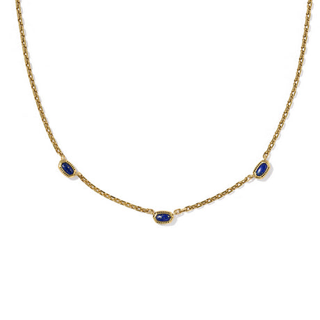 Gold necklace with blue stones on a white background