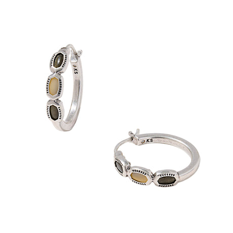 Silver hoop earrings with embedded stones on a white background