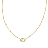 A delicate gold chain necklace featuring a central oval bezel-set pale blue-green stone, displayed on a clean white background.