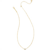 A delicate gold chain necklace featuring a small, oval-cut white gemstone pendant, displayed on a clean white background.