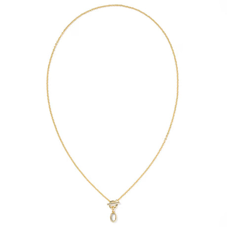 A delicate yellow gold chain necklace with a small geometric pendant and a teardrop-shaped clear gemstone, displayed on a clean white background.
