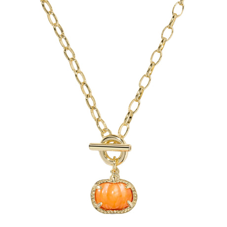 Gold necklace with a pumpkin-shaped pendant on a white background
