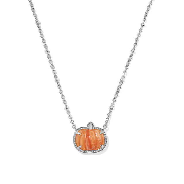 A silver chain necklace featuring a pumpkin-shaped pendant with a textured orange center and a border of small clear stones, shown on a plain white background.