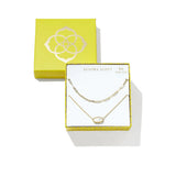Kendra Scott 925 Yellow Gold necklace set in an open presentation box, with a second closed yellow box behind it on a white background.