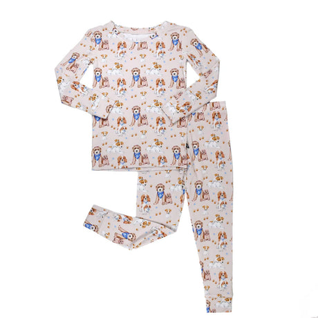 Children's pajama set with dog pattern on a white background