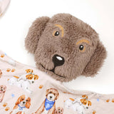 Plush dog toy with a patterned blanket featuring dog illustrations.