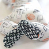 footies with heart pattern on a white background