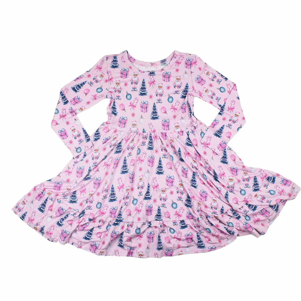 Pink children's dress with festive pattern on a white background