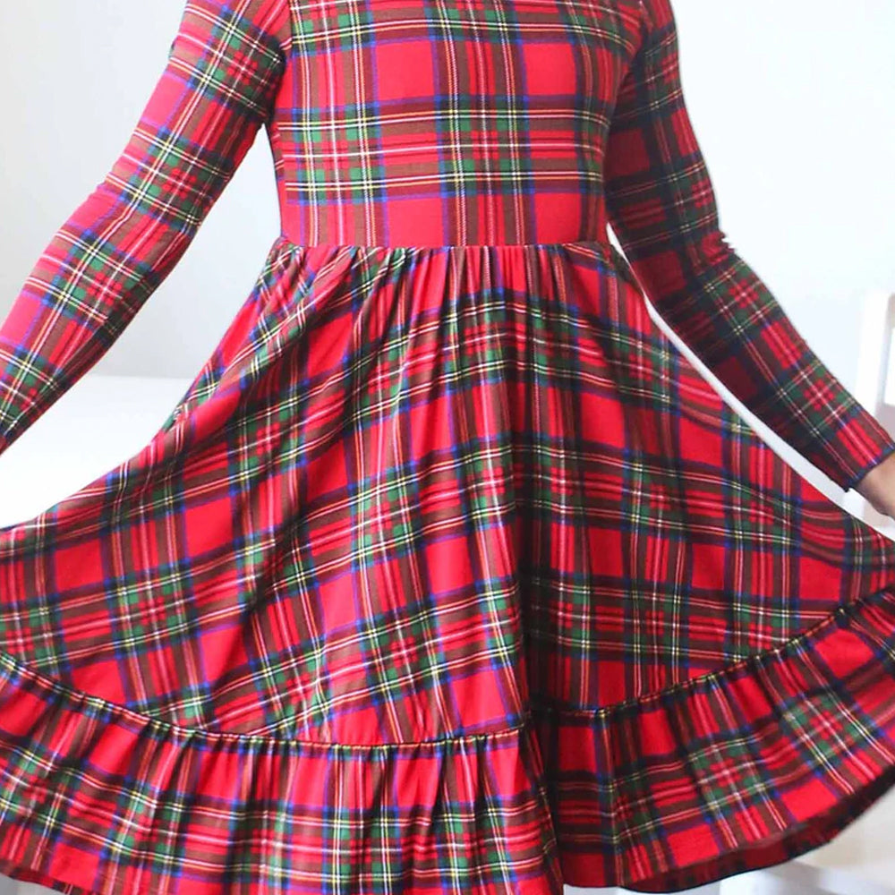 Red plaid dress with long sleeves on a white background