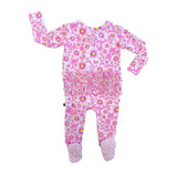 Pink floral baby onesie on a white background