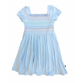 A light blue girls' dress with a smocked bodice, square neckline, and puffed short sleeves, shown against a plain white background.