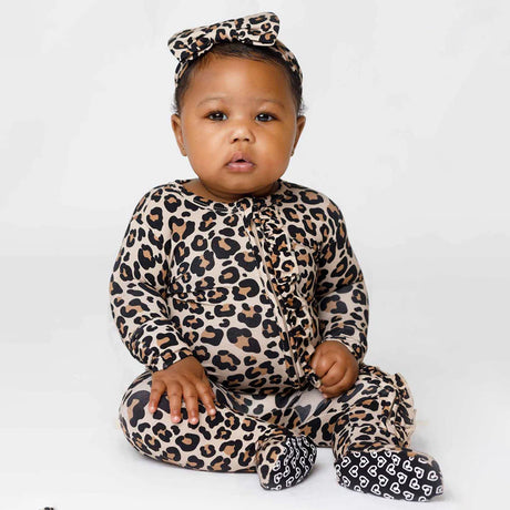 Child wearing a leopard print outfit 