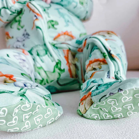 Folded fabric with animal pattern on a light background