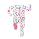 Baby onesie with colorful macaron pattern on a white background