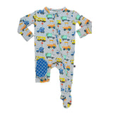 Children's onesie with truck pattern on a white background