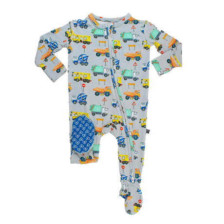 Children's onesie with truck pattern on a white background