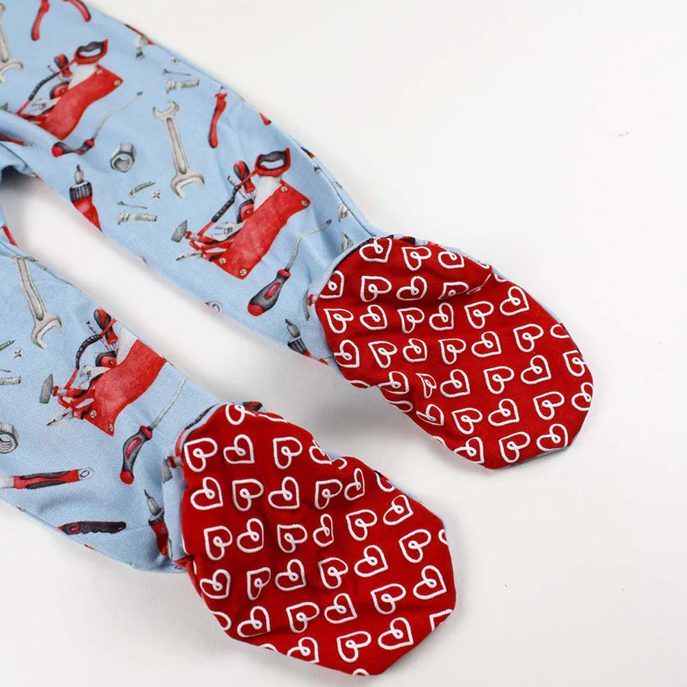 Pair of oven mitts with tool pattern on one and heart pattern on the other, on a white background.