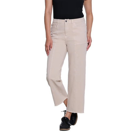 A model wearing a pair of light beige wide-leg cropped pants with a side slit, paired with a black top and black shoes, shown against a plain white background.