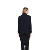 Person wearing a black outfit on a white background