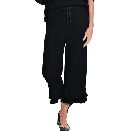 Black wide-leg pants with ruffled hem on a white background