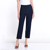 Navy blue pants worn by a person on a white background