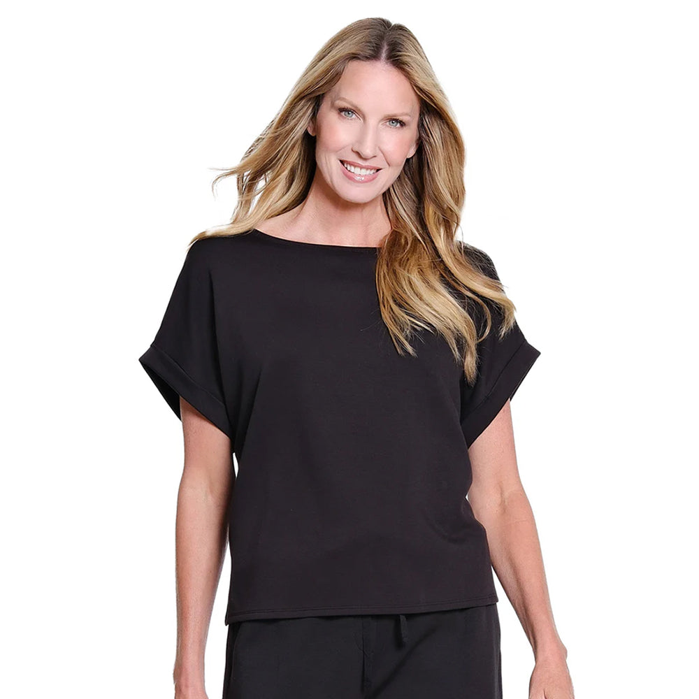 Woman wearing a black top on a white background